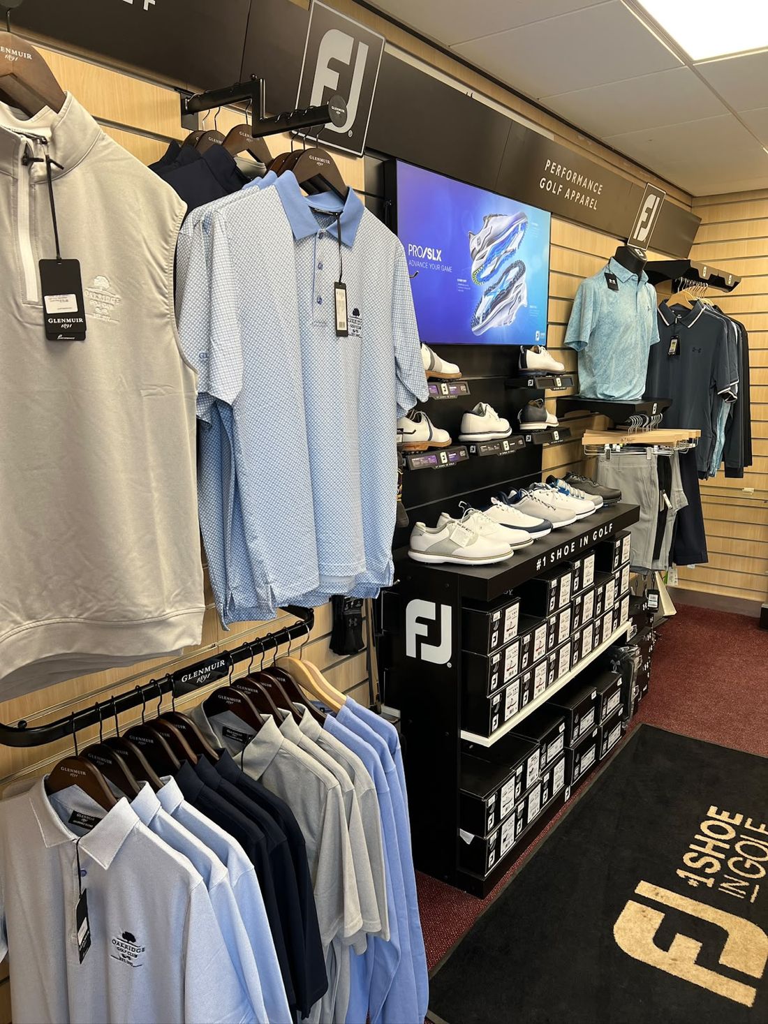 Golf clothing and shoes on display